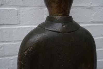 A pair of large Chinese bronze nodding-head figures for the Vietnamese market, 19th C.